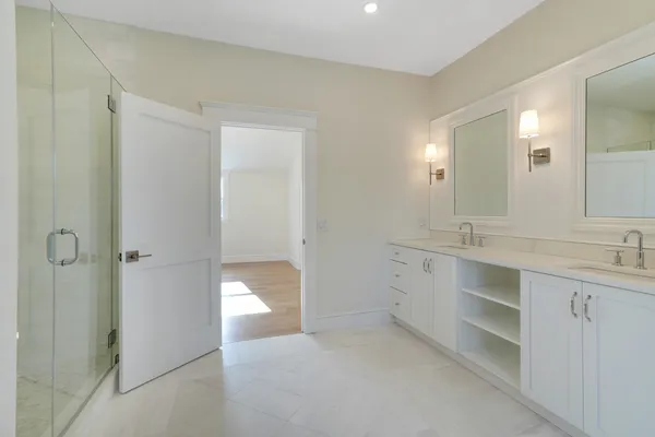 a kitchen with a refrigerator stove and sink