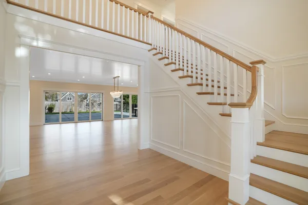 a large kitchen with stainless steel appliances kitchen island a large island in the center