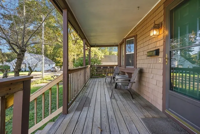 a view of balcony with furniture