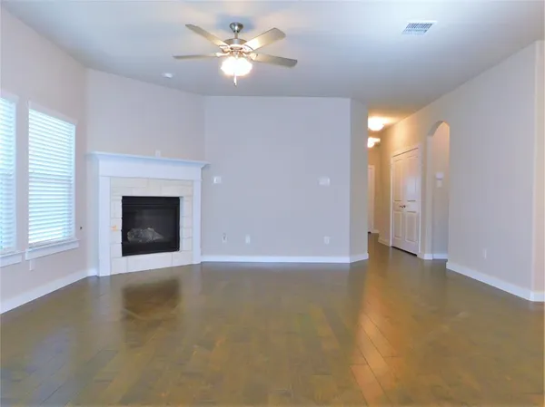 a living room with a fireplace