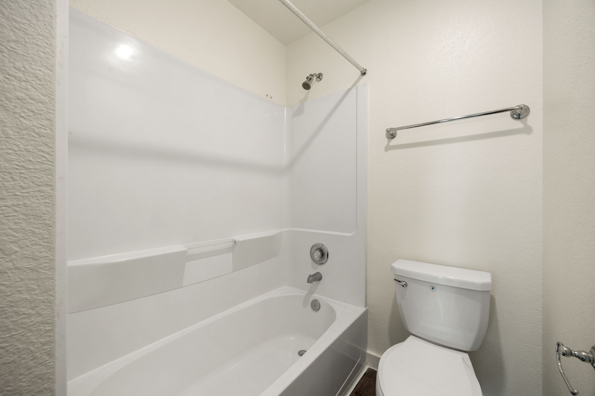 21155 Gosling Road, Unit 30 Spring, TX 77388 - Photo 19 of 32 a white toilet sitting next to a bath tub