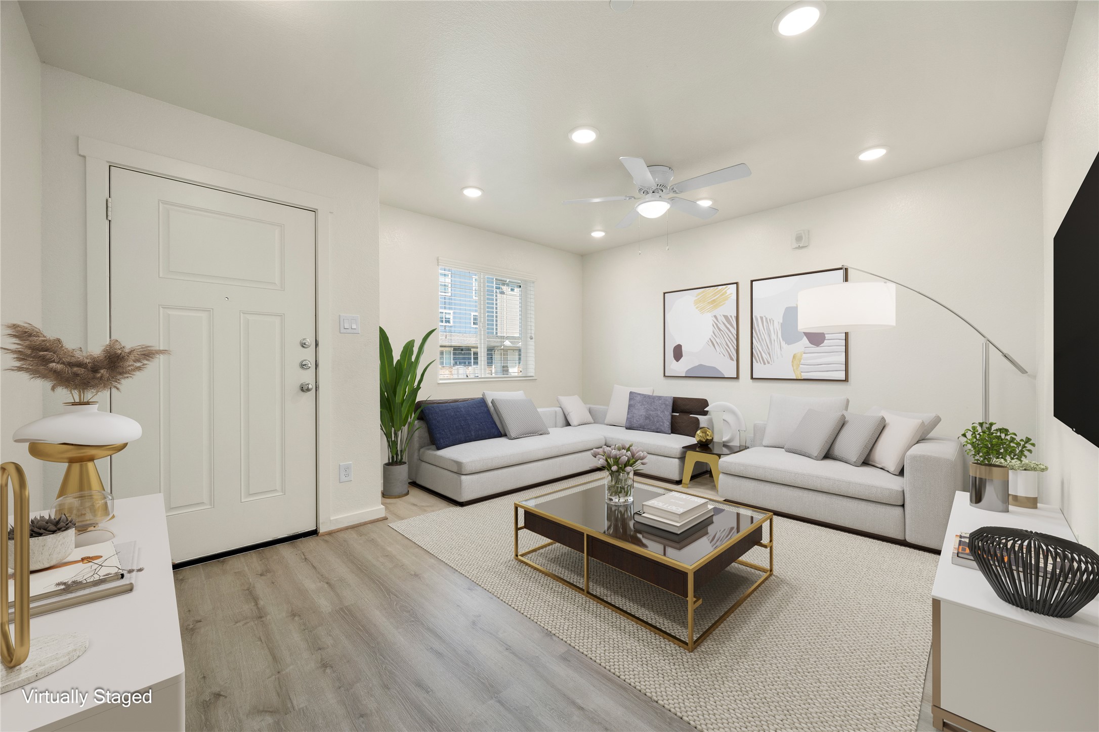 21155 Gosling Road, Unit 30 Spring, TX 77388 - Photo 2 of 32 a living room with furniture and a wooden floor