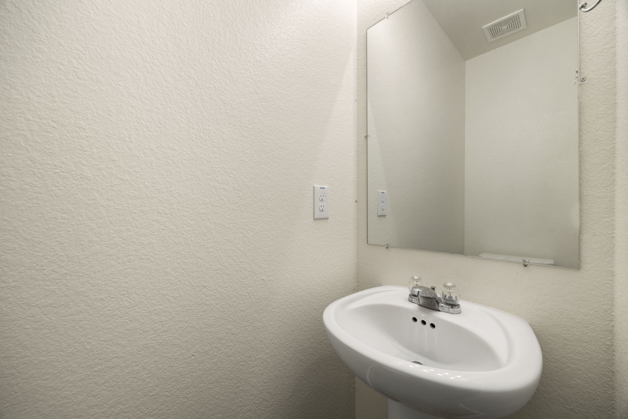 21155 Gosling Road, Unit 30 Spring, TX 77388 - Photo 21 of 32 a bathroom with a sink and a mirror