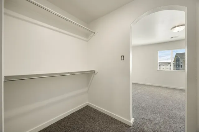 a view of an empty walk in closet