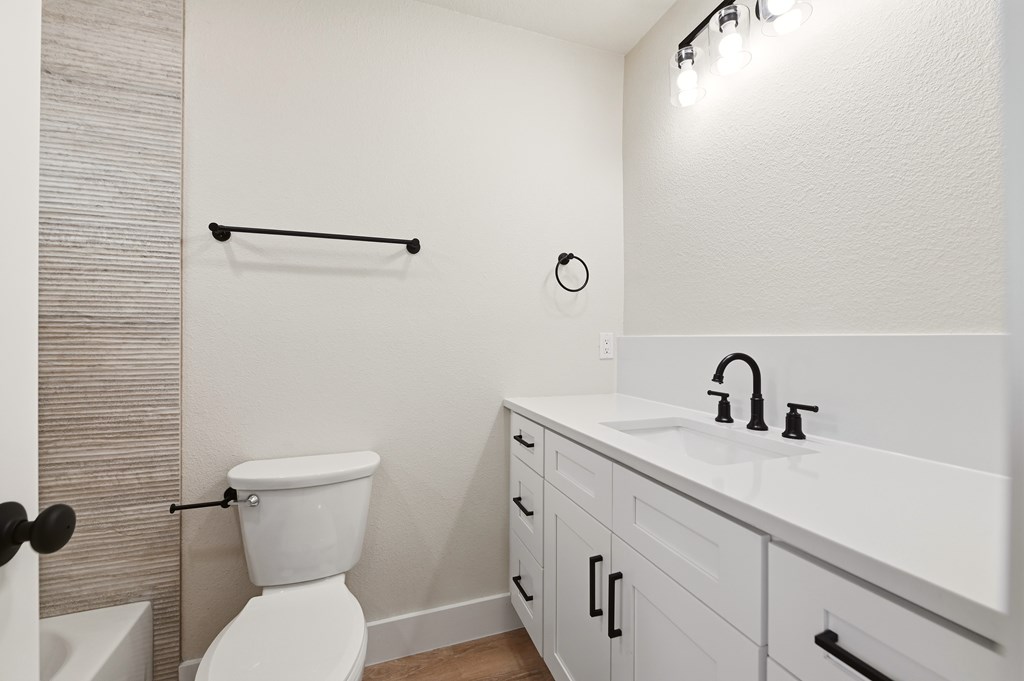 150 Oak Ridge Dr Center Point Center Point, TX 78010 - Photo 11 of 13 a bathroom with a toilet sink and mirror