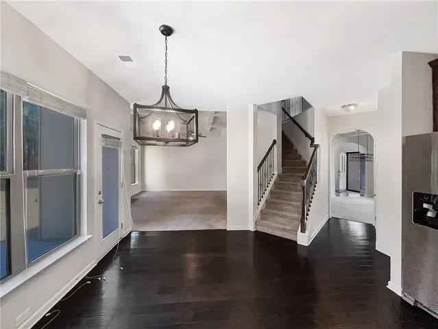 a view of entryway with livingroom