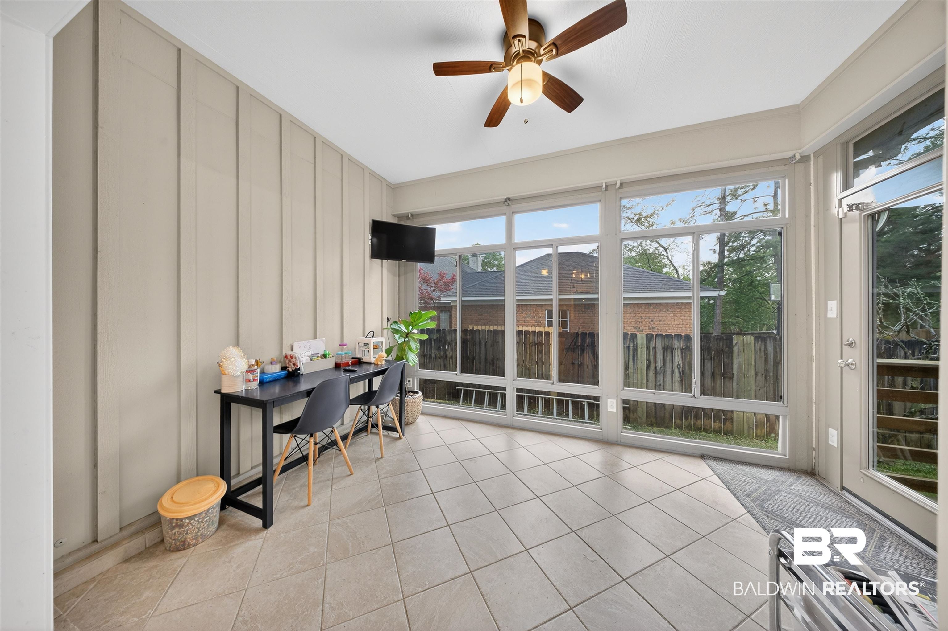 1250 Savannah Drive Mobile, AL 36609 - Photo 19 of 35 Sunroom / solarium with tile patterned flooring and a decorative wall
