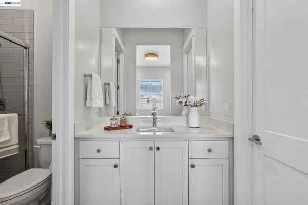 a view of a backyard with sitting area