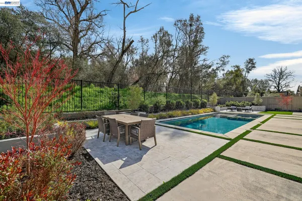 an aerial view of a house with a garden