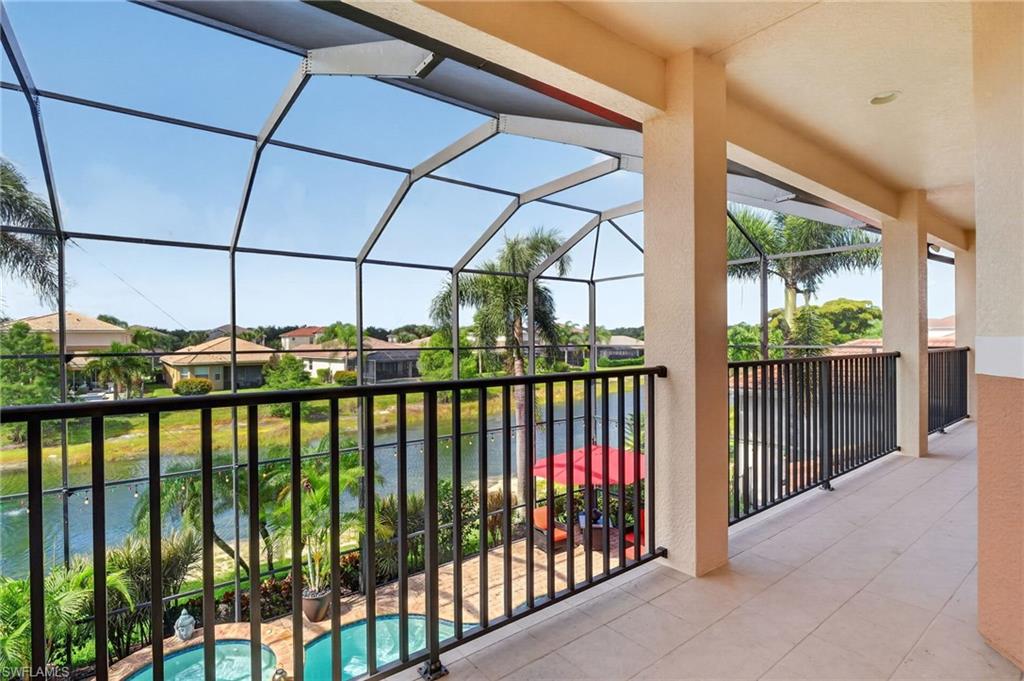 6598 Monterey Point Naples, FL 34105 - Photo 15 of 50 Veranda outside primary bedroom.