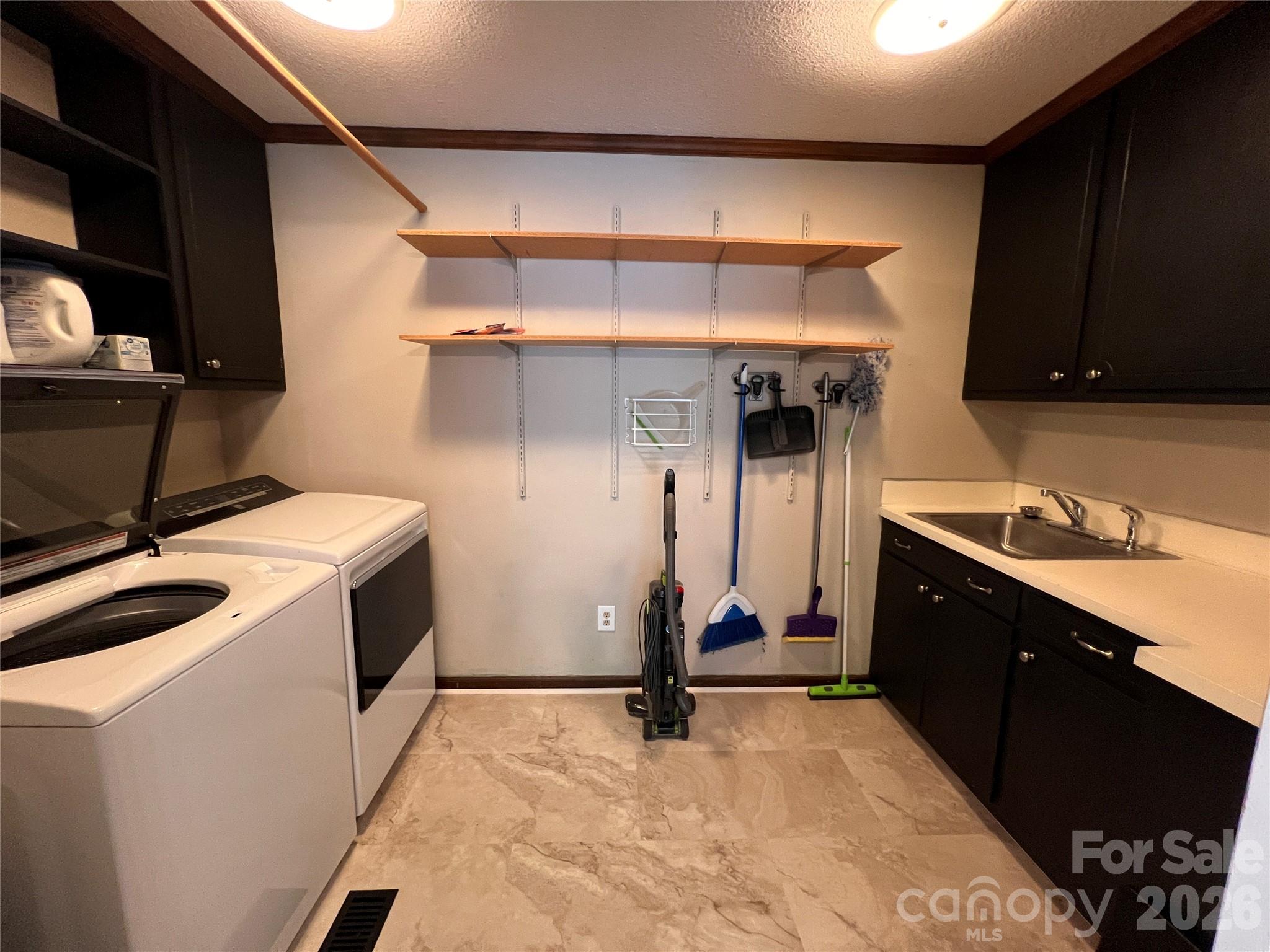 1426 Alf Hoover Road Vale, NC 28168 - Photo 11 of 35 a view of a kitchen with a sink and cabinets