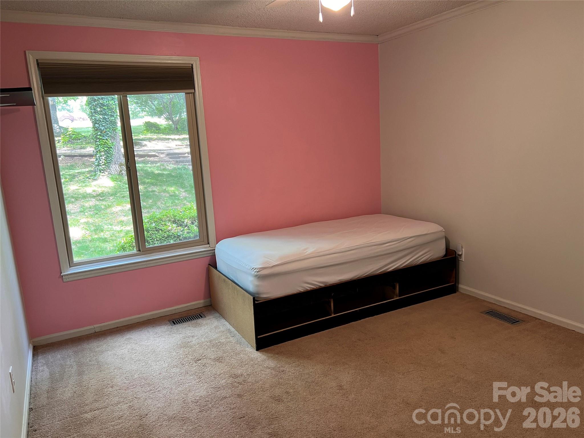1426 Alf Hoover Road Vale, NC 28168 - Photo 17 of 35 a room with a bed and window