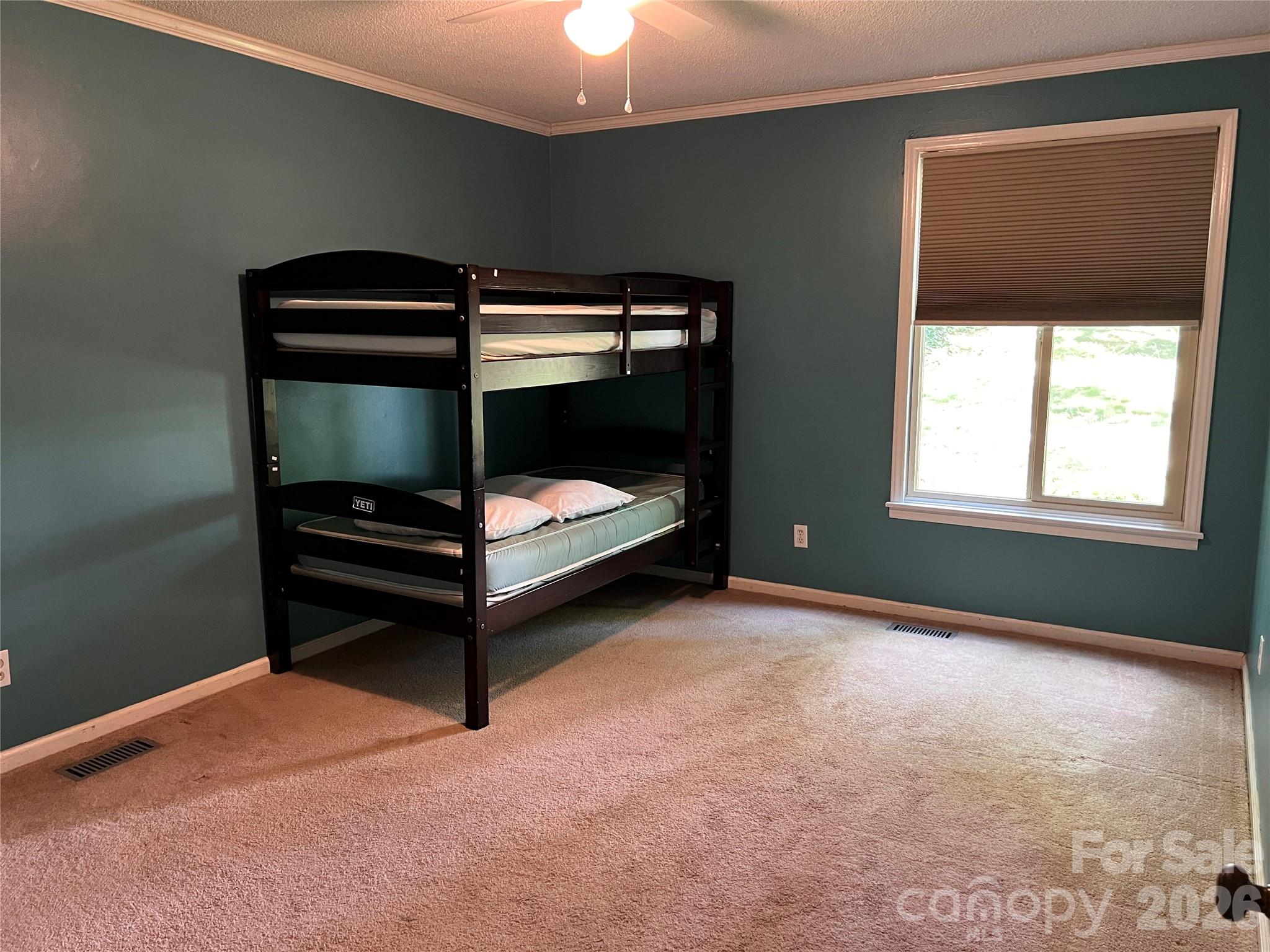 1426 Alf Hoover Road Vale, NC 28168 - Photo 19 of 35 a bedroom with window and closet
