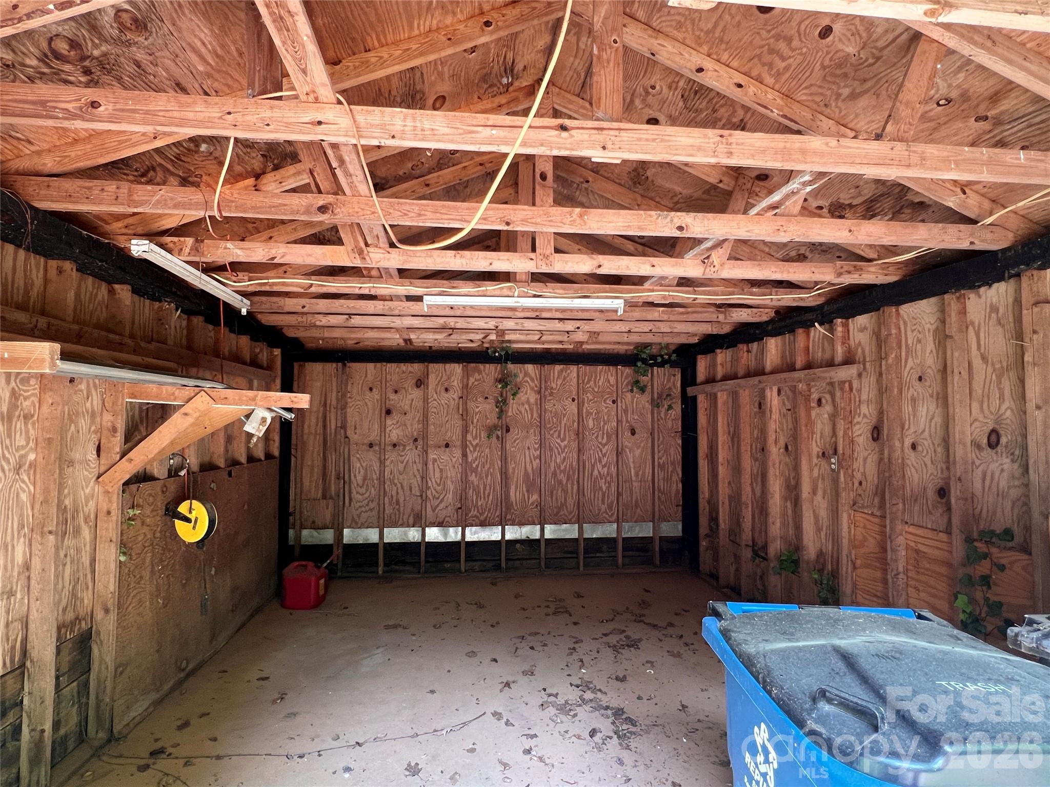 1426 Alf Hoover Road Vale, NC 28168 - Photo 30 of 35 a view of a room with wooden walls