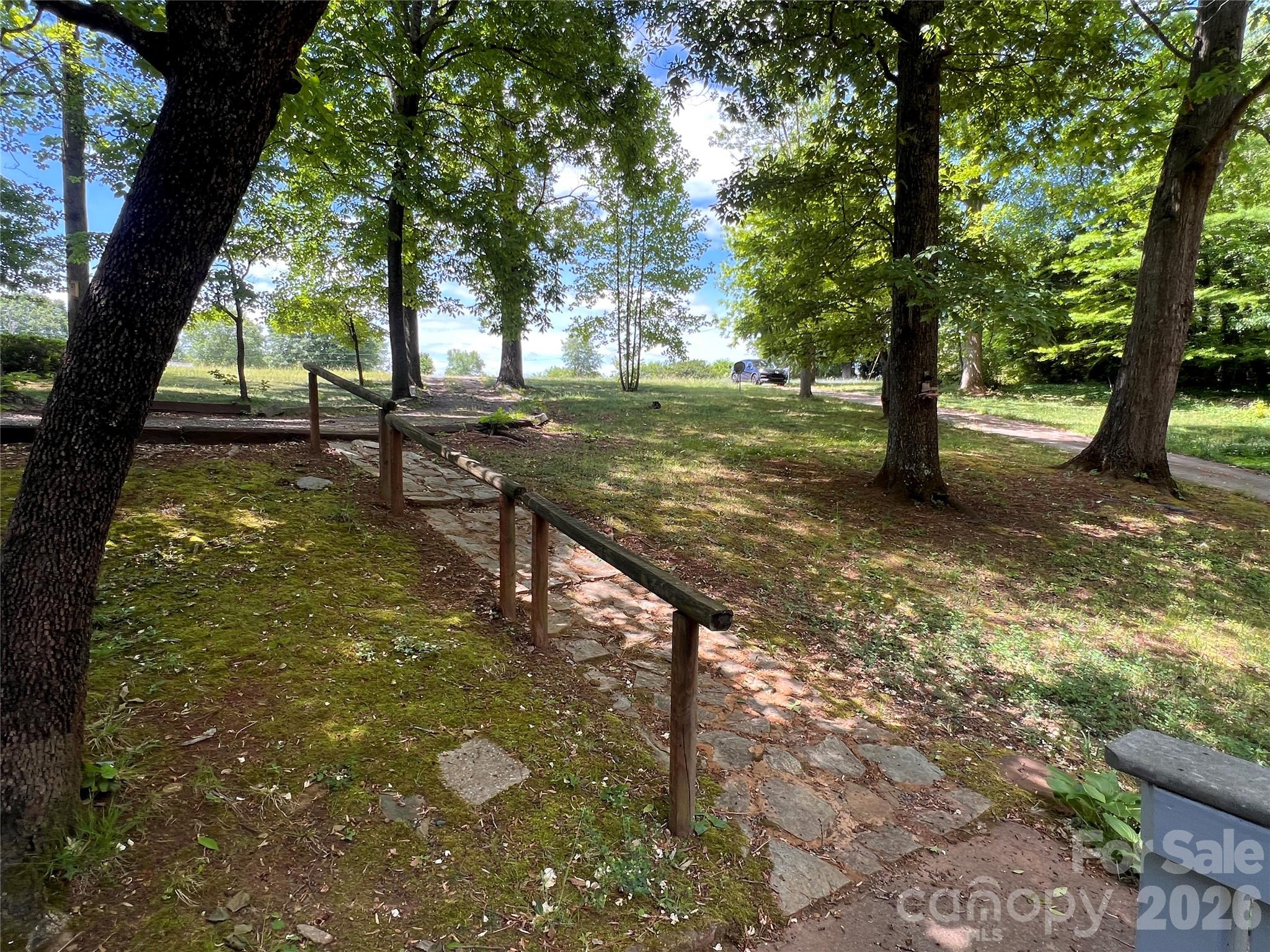 1426 Alf Hoover Road Vale, NC 28168 - Photo 34 of 35 a view of a yard with a tree