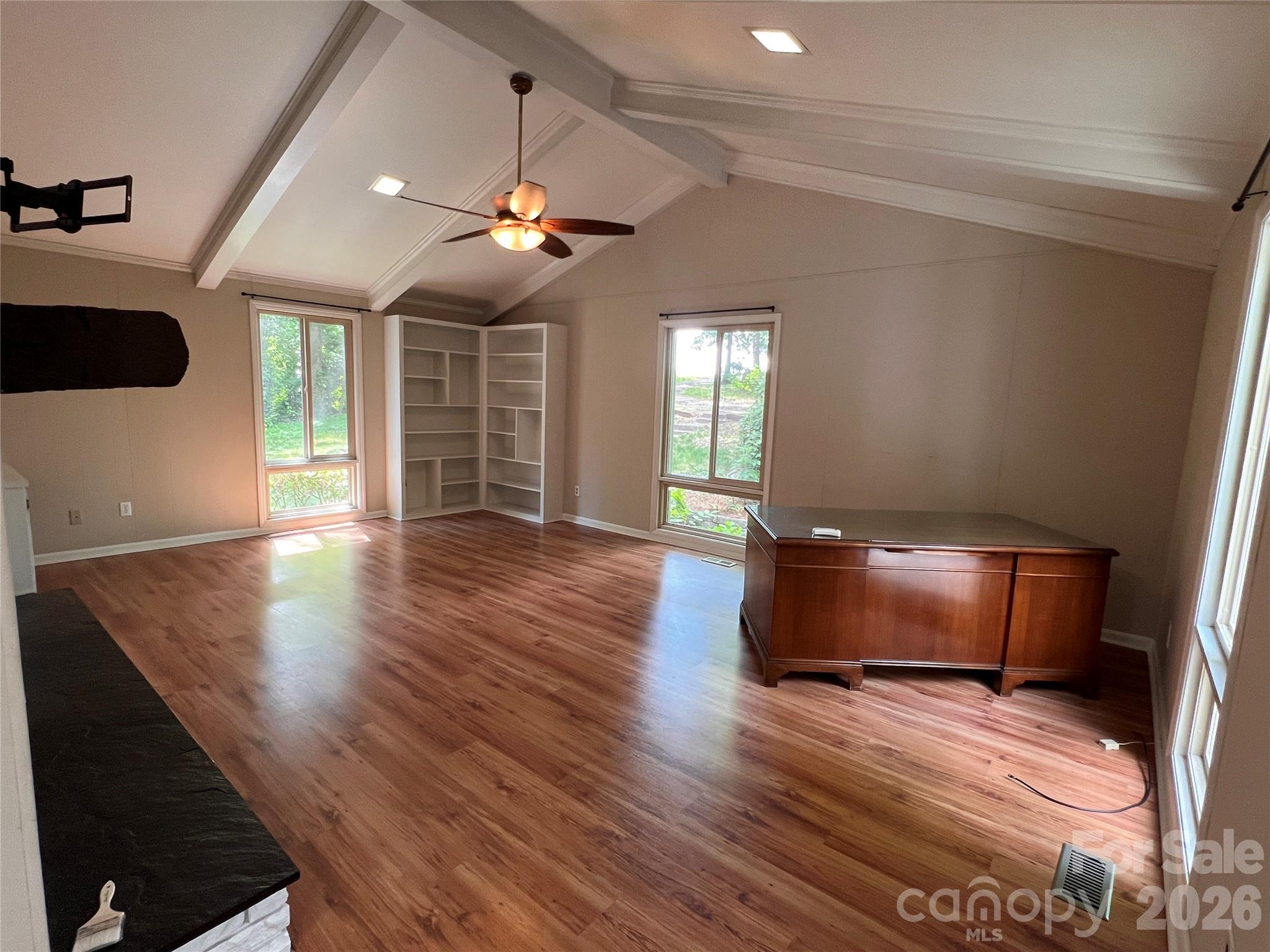 1426 Alf Hoover Road Vale, NC 28168 - Photo 6 of 35 a room with wooden floor chandelier entryway and windows