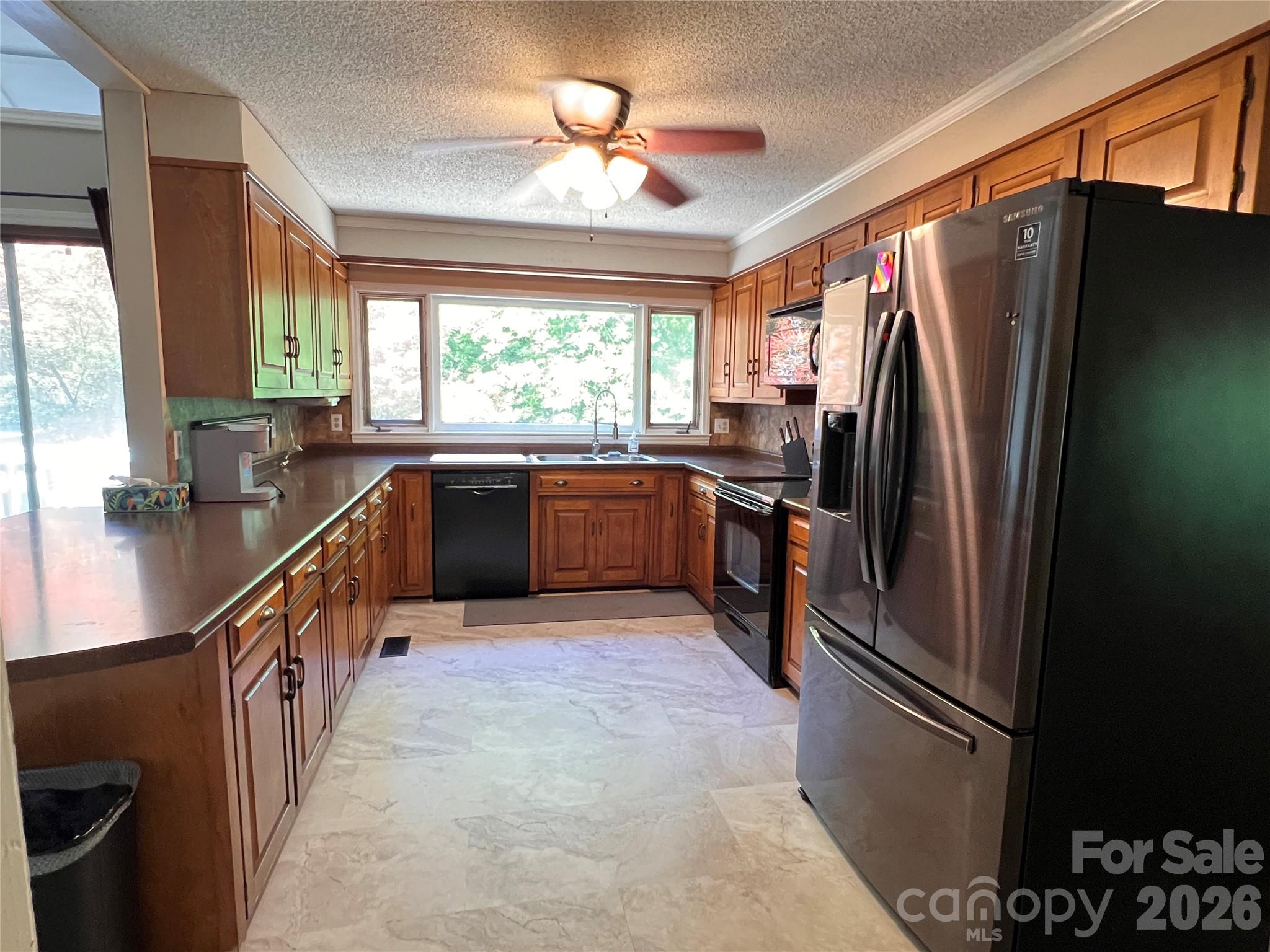 1426 Alf Hoover Road Vale, NC 28168 - Photo 8 of 35 a kitchen with stainless steel appliances granite countertop a refrigerator a sink a stove and a sink
