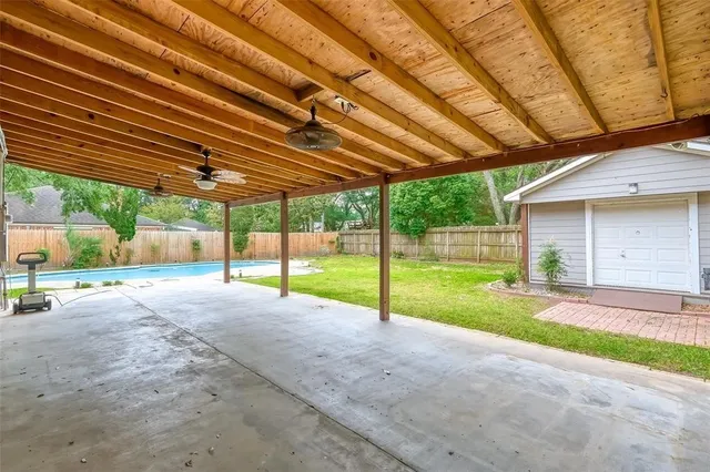 a view of a backyard with porch