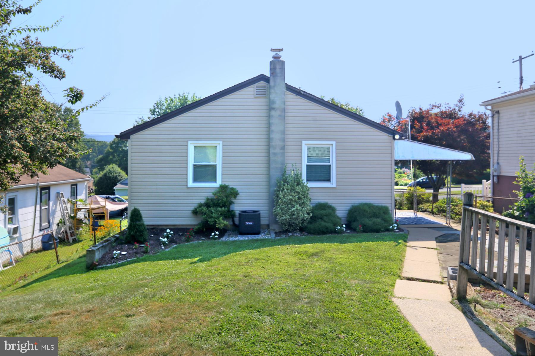 1217 Broadway Boulevard Reading, PA 19607 - Photo 29 of 35 a view of a house with a yard and furniture