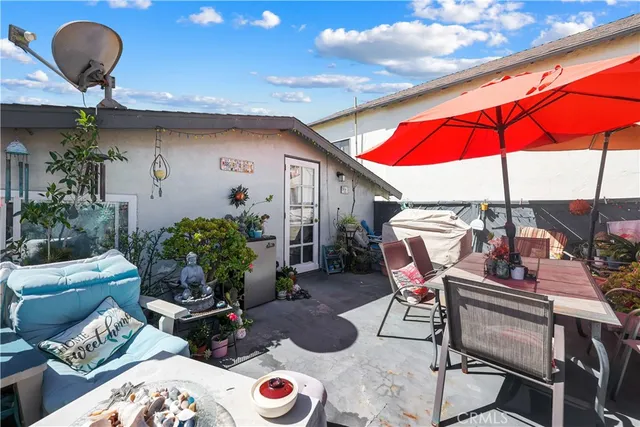 a view of a tables and chairs in patio