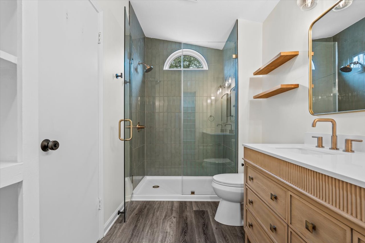 4004 Danli Lane Austin, TX 78749 - Photo 35 of 40 a bathroom with a sink a toilet and shower