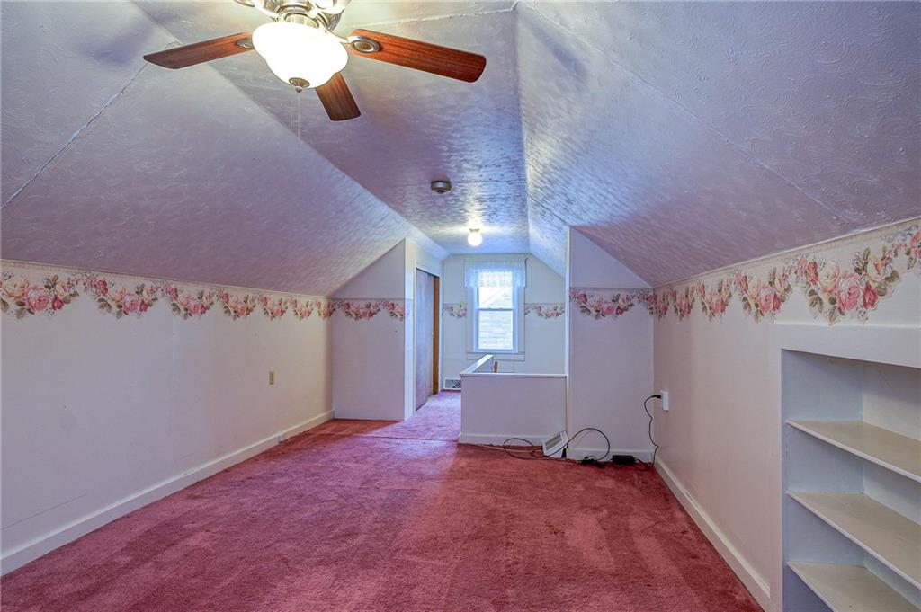 1224 Eckert Road Monaca, PA 15061 - Photo 12 of 18 a view of a livingroom with a ceiling fan and window