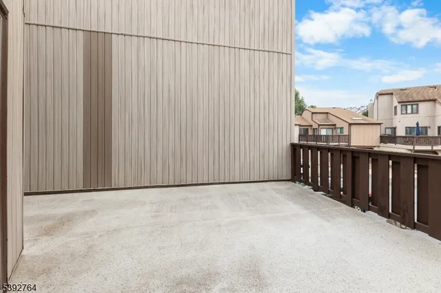 a view of a balcony with city view