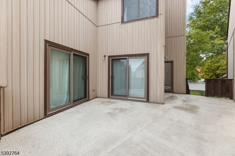 65 Diamond Lane Old Bridge, NJ 08857 - Photo 25 of 33 an empty room with windows and yard