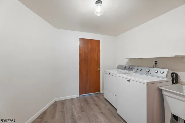 a view of utility room with washer and dryer