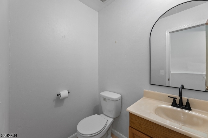 65 Diamond Lane Old Bridge, NJ 08857 - Photo 28 of 33 a bathroom with a sink and a toilet