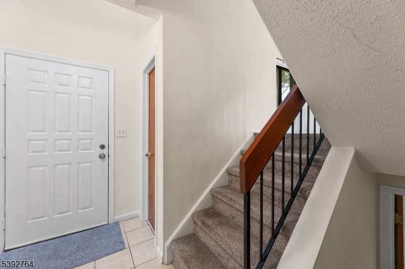 65 Diamond Lane Old Bridge, NJ 08857 - Photo 3 of 33 a view of staircase with railing and white walls