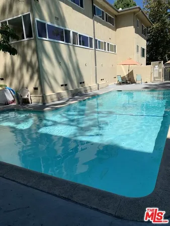 a view of a back yard of the house