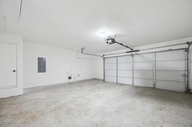 a view of a house with pool and chairs