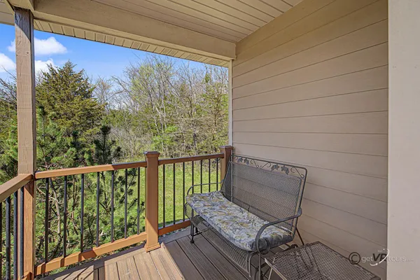 a view of a chair in a balcony