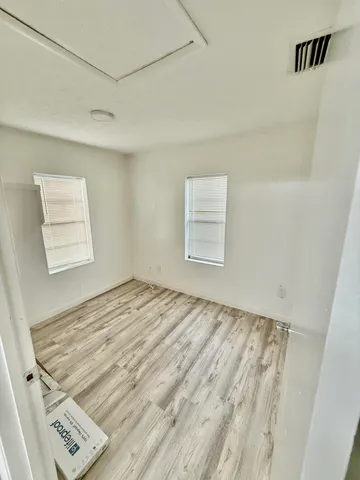 a view of an empty room and window