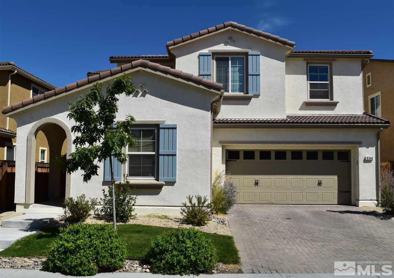 9340 Lost Valley Road Reno, NV 89521 - Photo 1 of 1 a front view of a house with garden