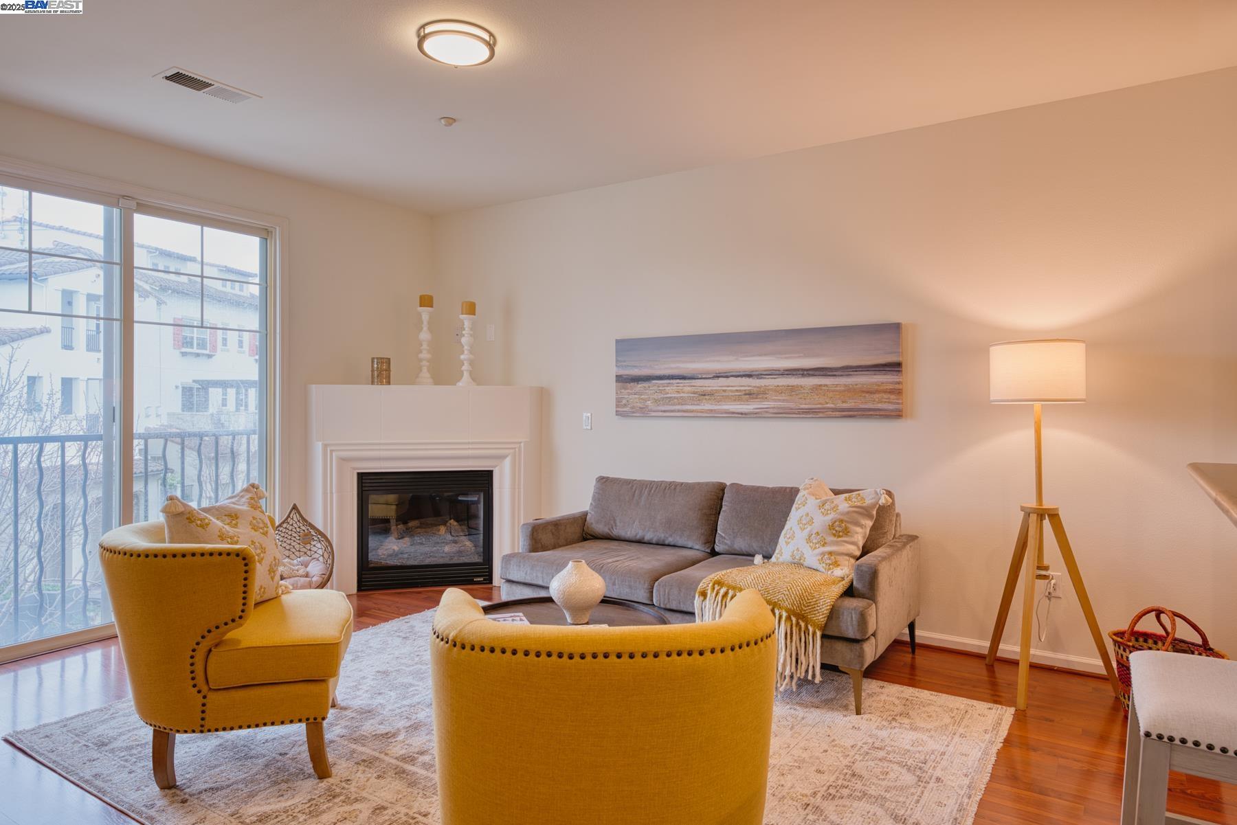 4206 Clarinbridge Circle Dublin, CA 94568 - Photo 1 of 1 a living room with furniture and a fireplace
