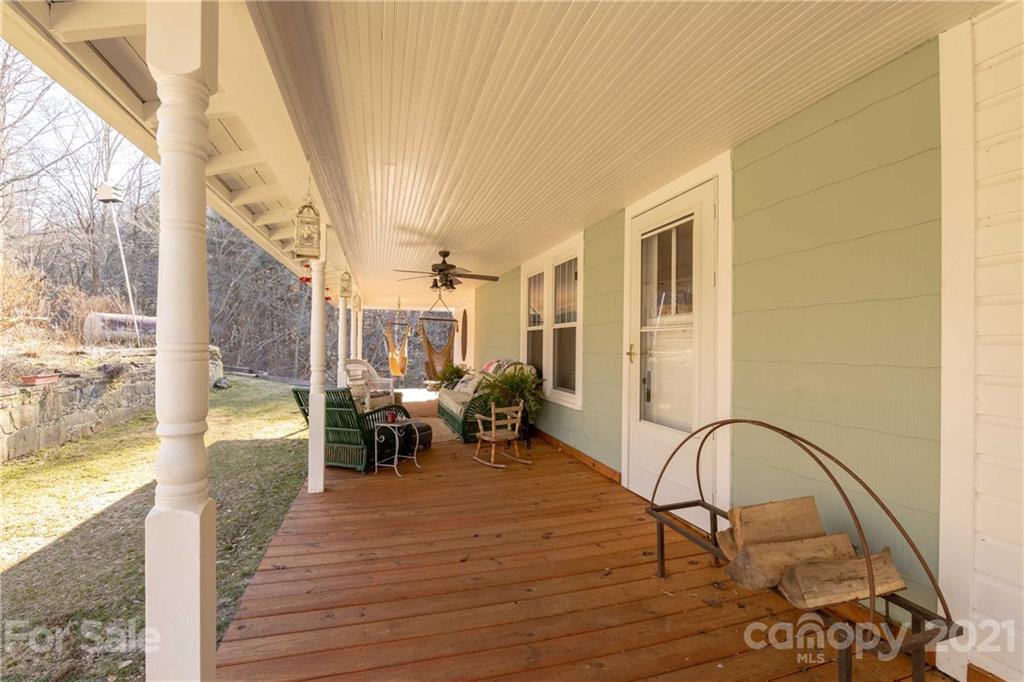 39 Baileys Peak Road Spruce Pine, NC 28777 - Photo 3 of 47 a living room filled with furniture