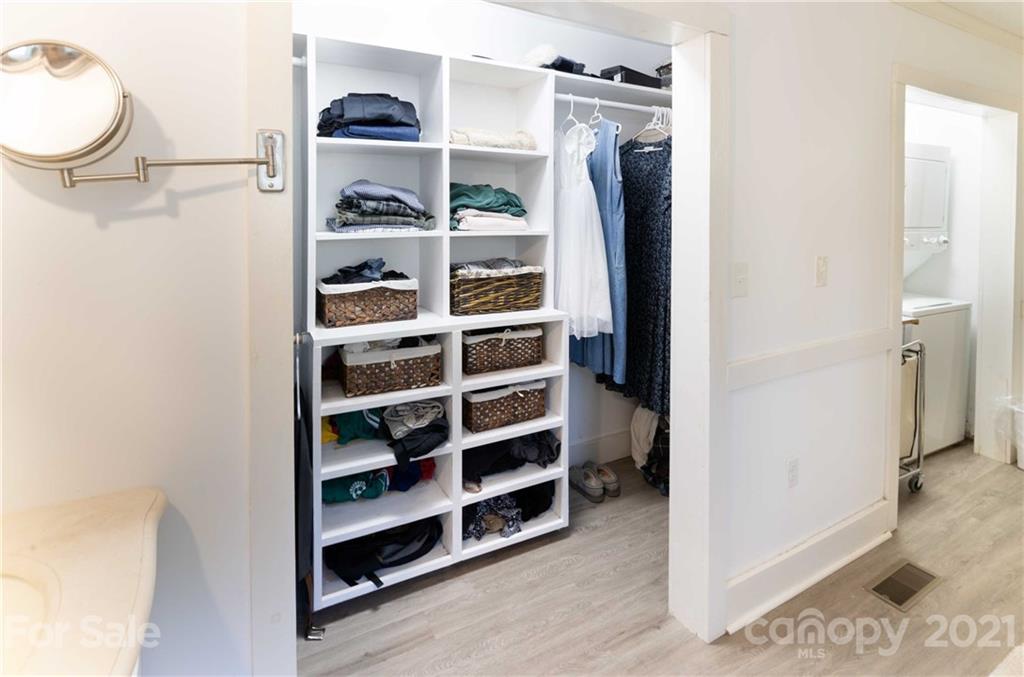 39 Baileys Peak Road Spruce Pine, NC 28777 - Photo 26 of 47 a view of walk in closet with clothes and shoes