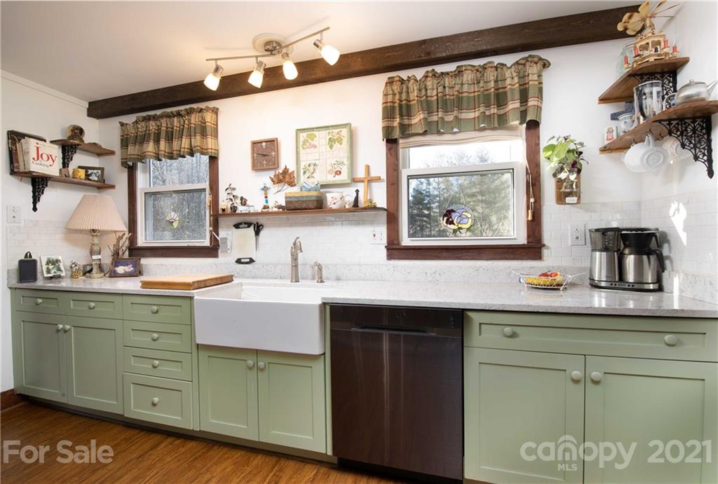 39 Baileys Peak Road Spruce Pine, NC 28777 - Photo 9 of 47 a kitchen with a sink cabinets and window