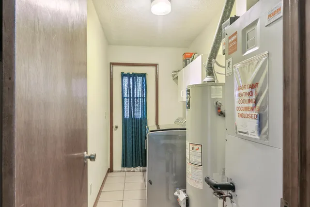a bathroom with a shower and a mirror