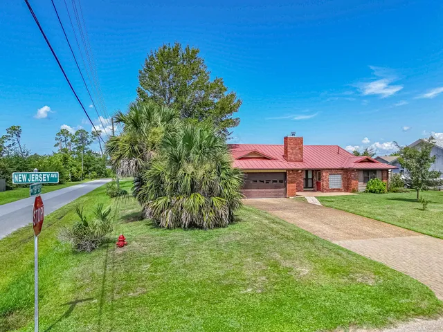 a house view with a garden space