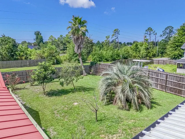 a view of a garden with a lake
