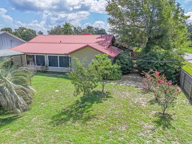 a view of a house with a garden