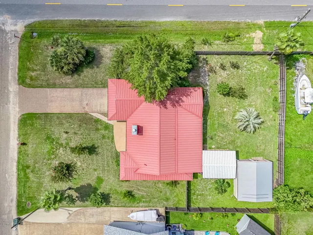a view of a yard with an outdoor space