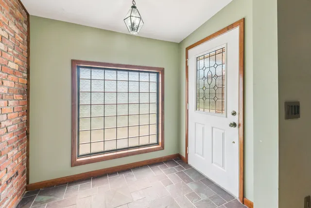 an empty room with windows