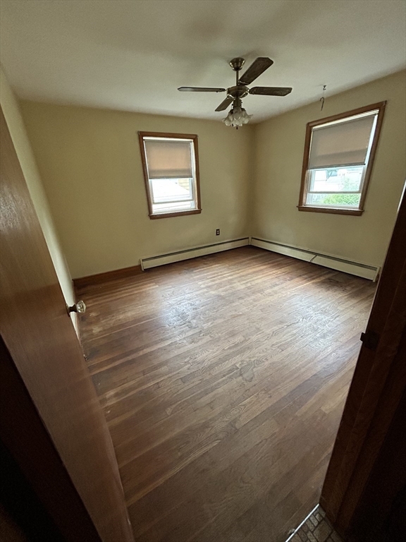39 Longmeadow Road Beverly, MA 01915 - Photo 6 of 12 en empty room with windows and ceiling fan