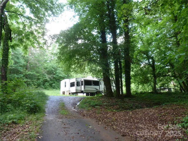 a house view with a backyard space