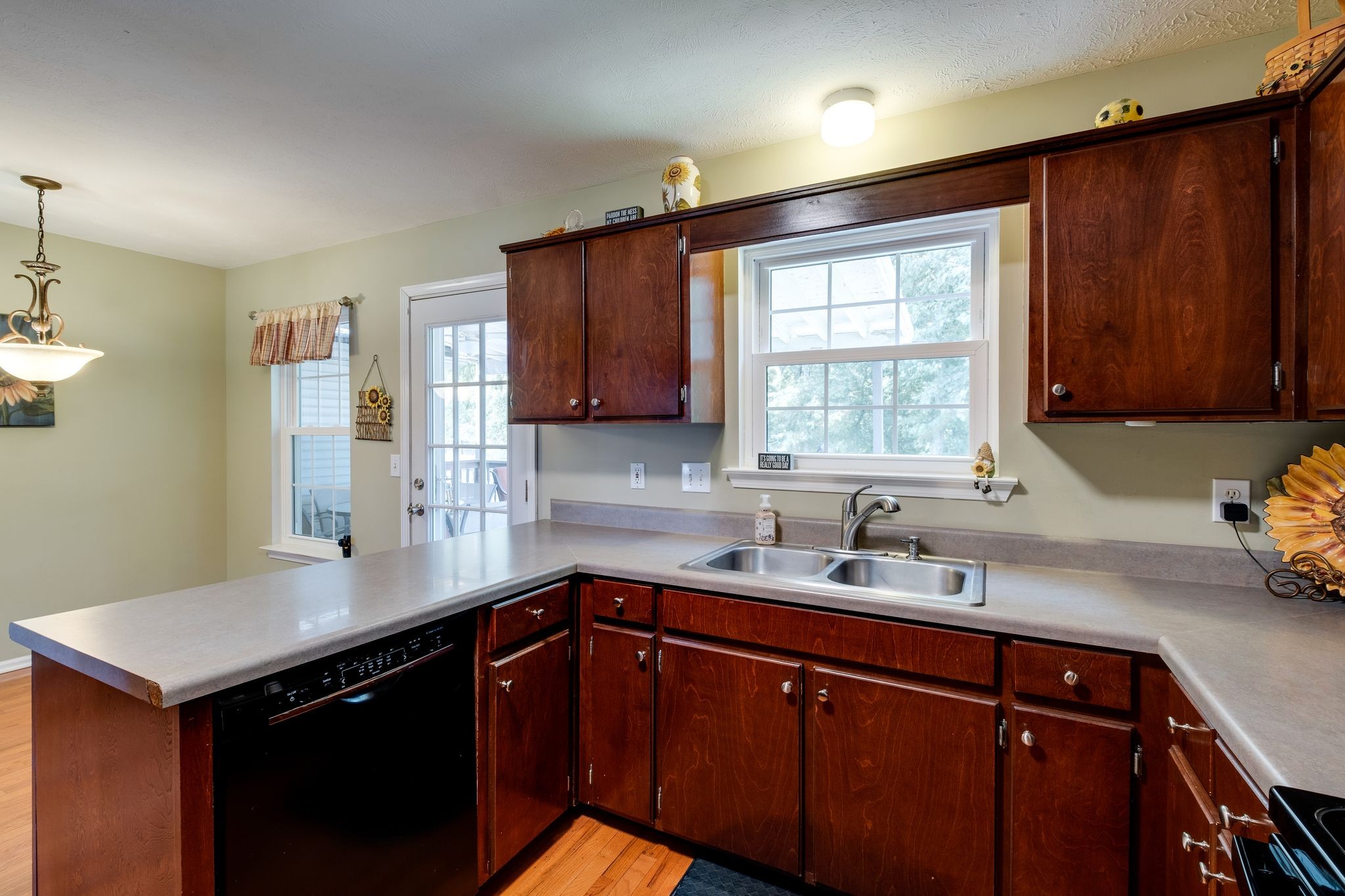 1040 Windtree Trace Mount Juliet, TN 37122 - Photo 12 of 30 a kitchen with a sink a window and cabinets