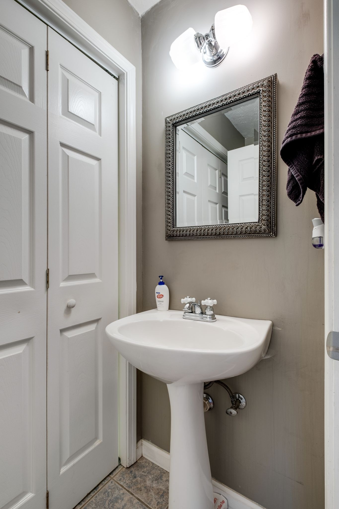 1040 Windtree Trace Mount Juliet, TN 37122 - Photo 19 of 30 a bathroom with a sink a mirror and a toilet